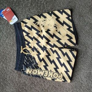 Boys Pokemon Pikachu Black Gold Zigzag Swim Trunks UPF 50+ Size XS 4/5 liner NWT
